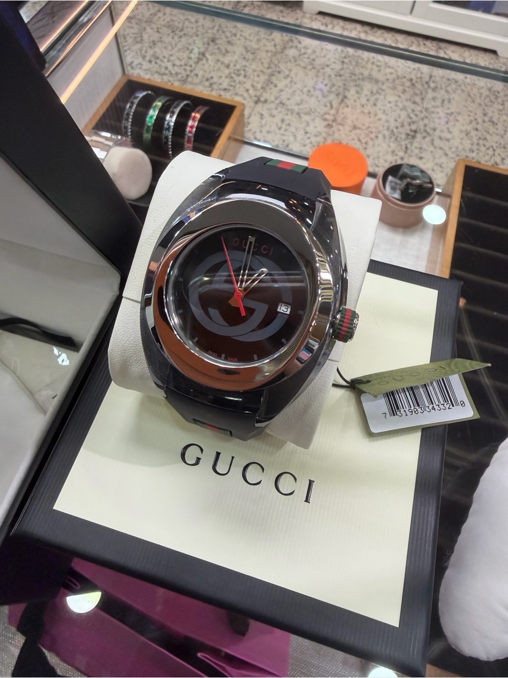 Gucci Black Dial Watch with Red Second Hand and Green-Red Accents
